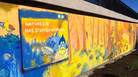 Mural at the Ronga underpass. The picture shows an environmental artwork.