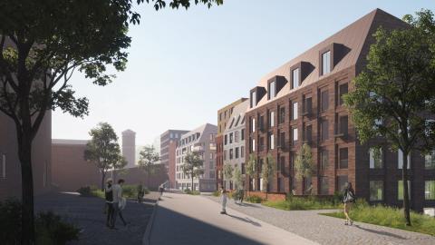 Havainnekuvassa Hiedanrannan Tehdaskartanonkatua ja uusia taloja, vesitorni näkyy.