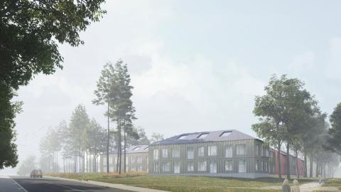 Havainnekuvassa katu, nurmikkoa ja puita, taustalla rakennuksia.