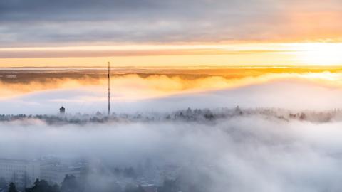 A hazy sunset view towards Pyyniki Ridge.
