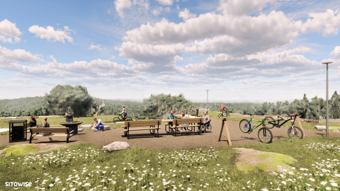 Havainnekuva Hervannanmäen huipulta, jossa näkyy nuotiopaikka, pöytiä ja tuoleja.