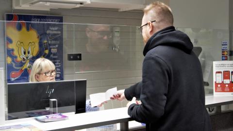 A customer visiting the Sports Services` customer service point.