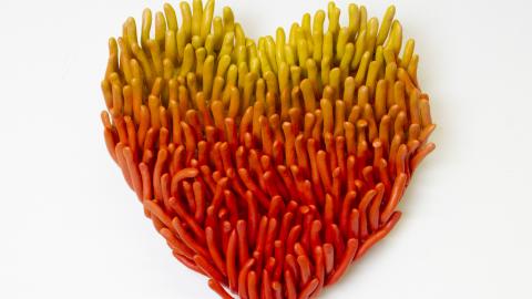 Auringonlaskun sydän sydämenmuotoinen taideteos