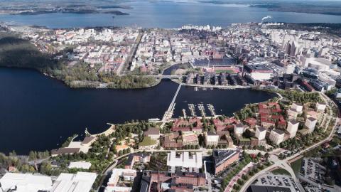 Kuvassa ilmakuvaan sovitettuja uusia rakennuksia.