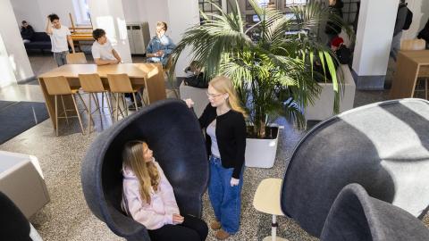 Two students chat at Lyseo High School.