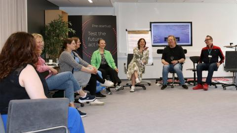 Working life educators discussing together.