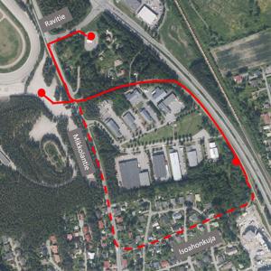 Ilmakuvassa reittikartta punaisella. 