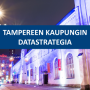 Datastrategian kansikuva, jossa taustalla Finlaysonin alueen valkoiset talot yöllä sinisessä valaistuksessa.