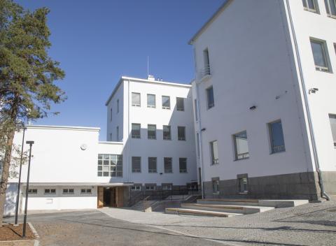 Renovated Pispala school on a sunny day.