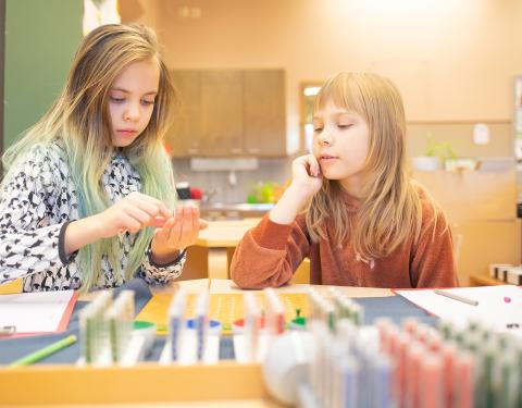 Two children at a lesson.