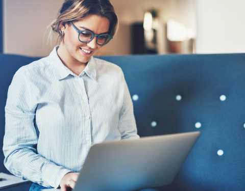 Woman watching her laptop
