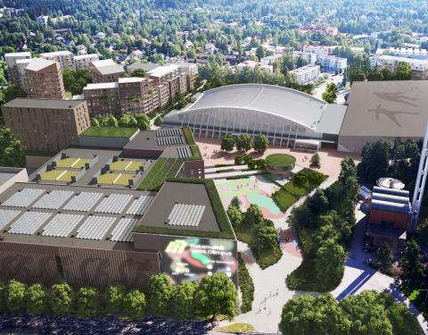 Kuvassa urheiluhalleja ja asuinrakennuksia sekä viheraluetta.