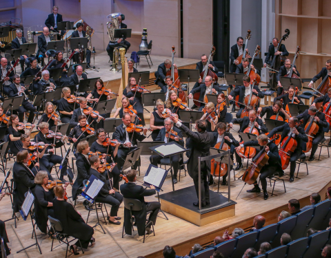 The Tampere Philharmonic Orchestra on stage at Tampere Hall.