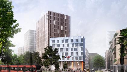 Hatanpään valtatien varrella sijaitseva hotelli, jonka edustalta ajaa ratikka. 