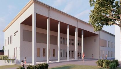 Lamminpään uuden kolmikerroksisen koulurakennuksen suunnittelukuvassa sisäänkäynnin edustalla on pylväikkörivistö.