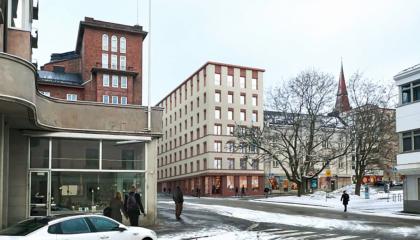 Kuvassa vanhaa kaupunkirakennetta ja uusi talo.