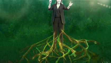 A figure conducts music in a green forest-like setting, with the figure’s legs transforming into branching roots extending into the ground.