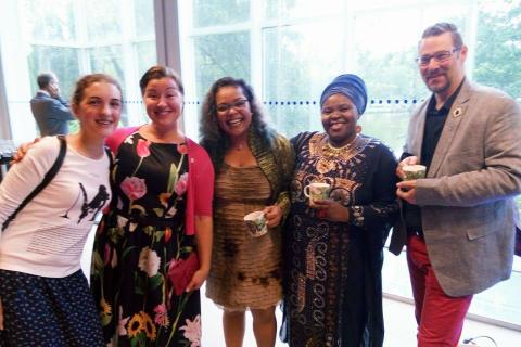 Group of Tampere Ambassadors standing in the Moomin museums opening event.
