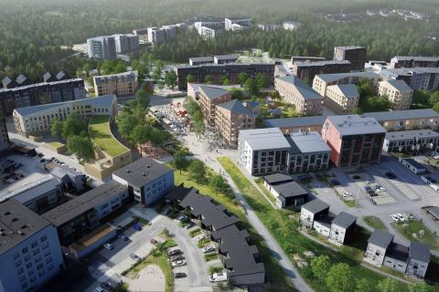 New buildings in area of green surroundings.